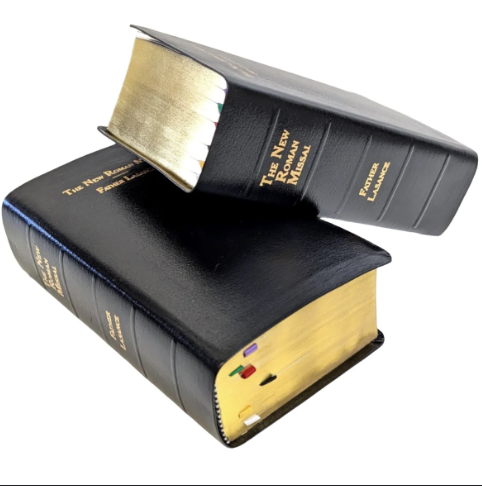 Two Catholic Missals stacked one on the other